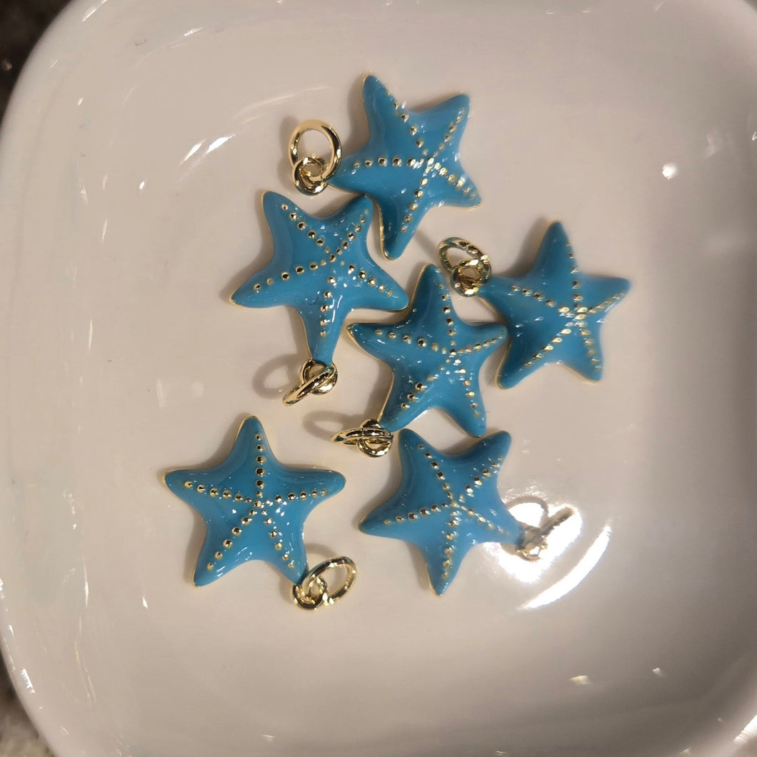 Gold enamel starfish charm